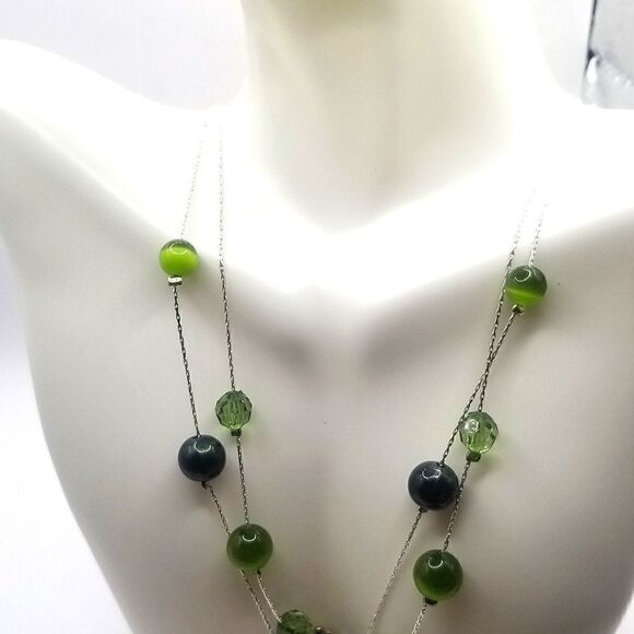 silver toned layered green floating Beaded womans necklace and earrings set. - Picture 8 of 9